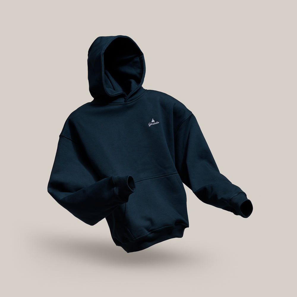Navy Gårdisto heavyweight hoodie, front three-quarter view